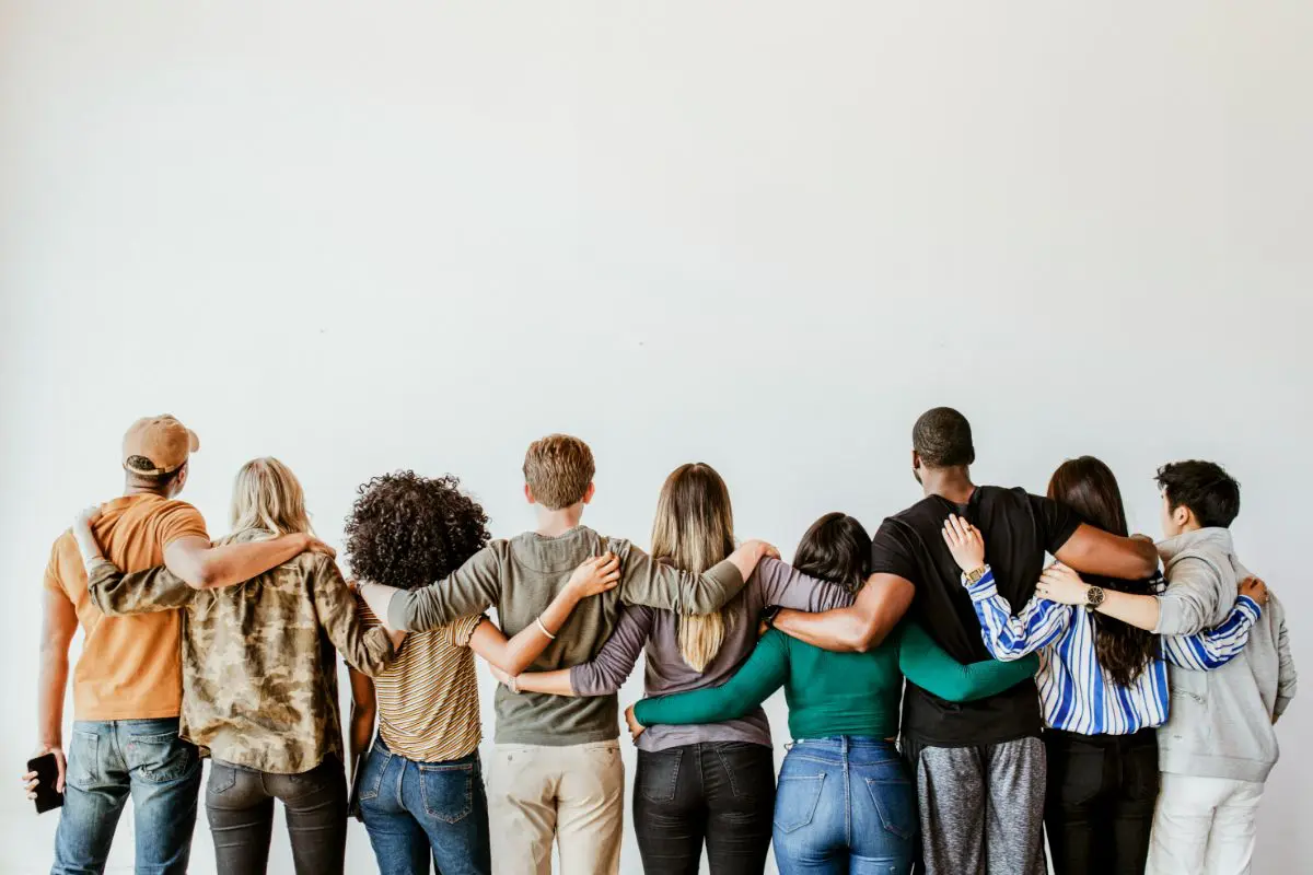 A group of people standing next to each other.