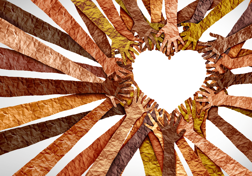 A heart made of hands with brown and tan colors.